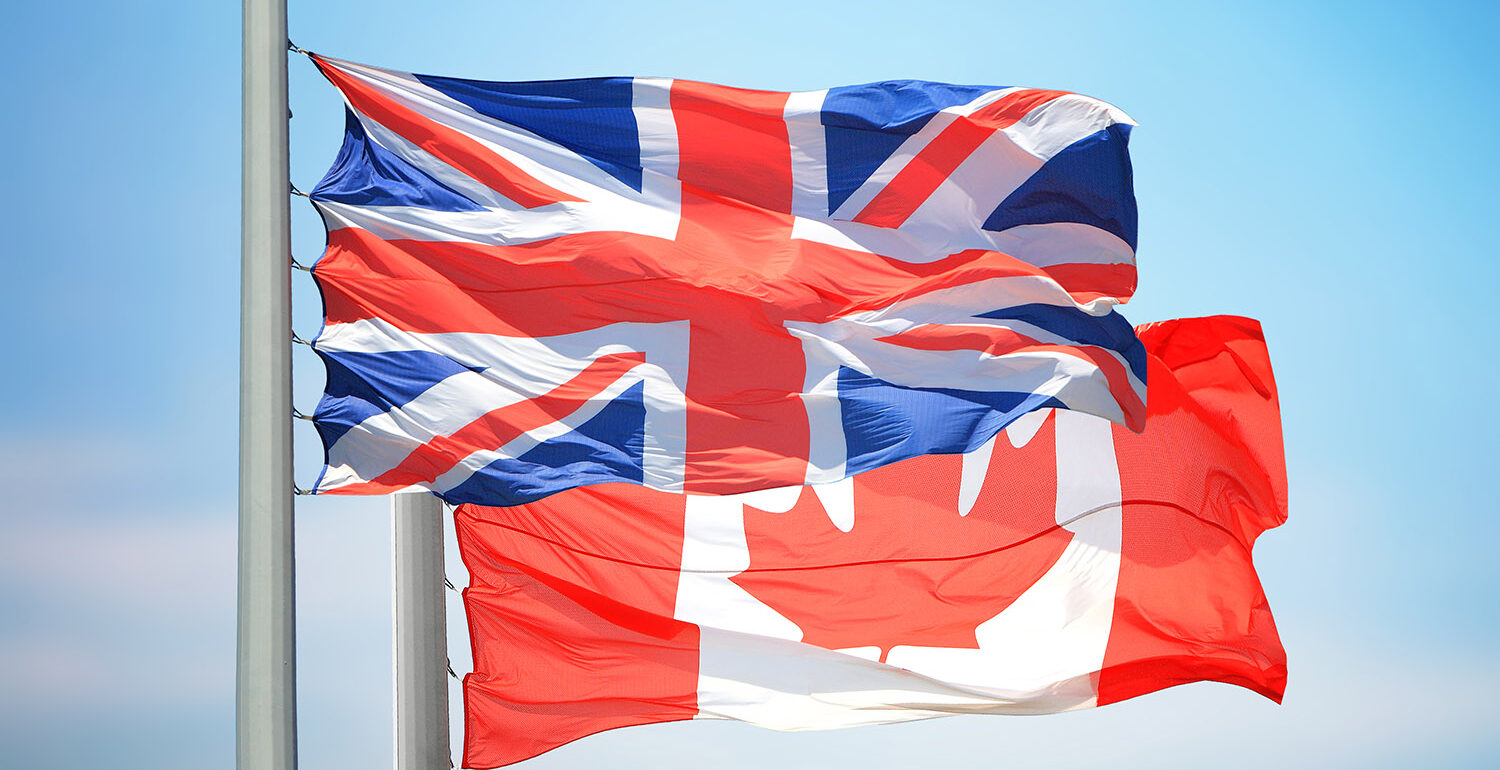 The UK and Canadian flags flying together.